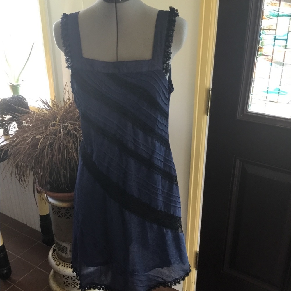 Lightweight and lacy navy blue knee high dress